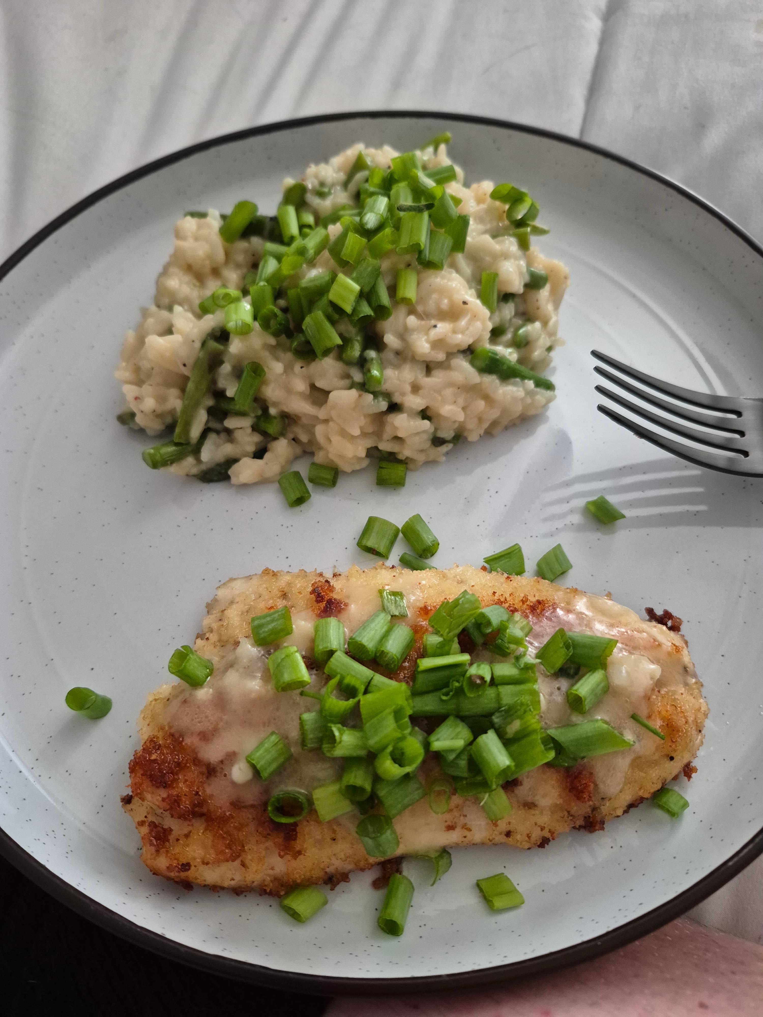 Plated chicken and risotto